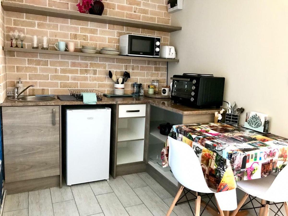 Posto Al Sole - Il Bacio Apartment Bellville Luaran gambar
