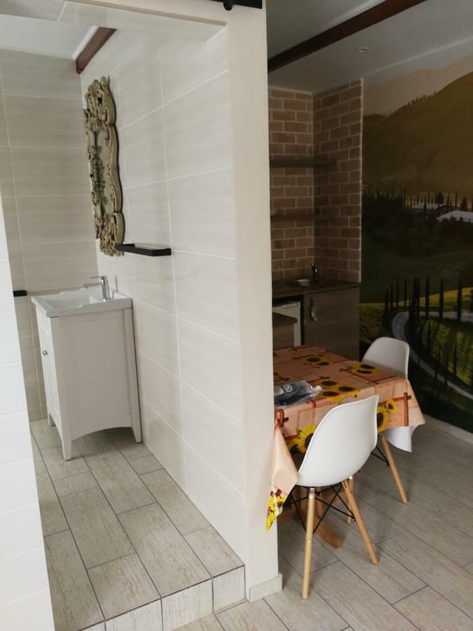 Posto Al Sole - Il Bacio Apartment Bellville Luaran gambar