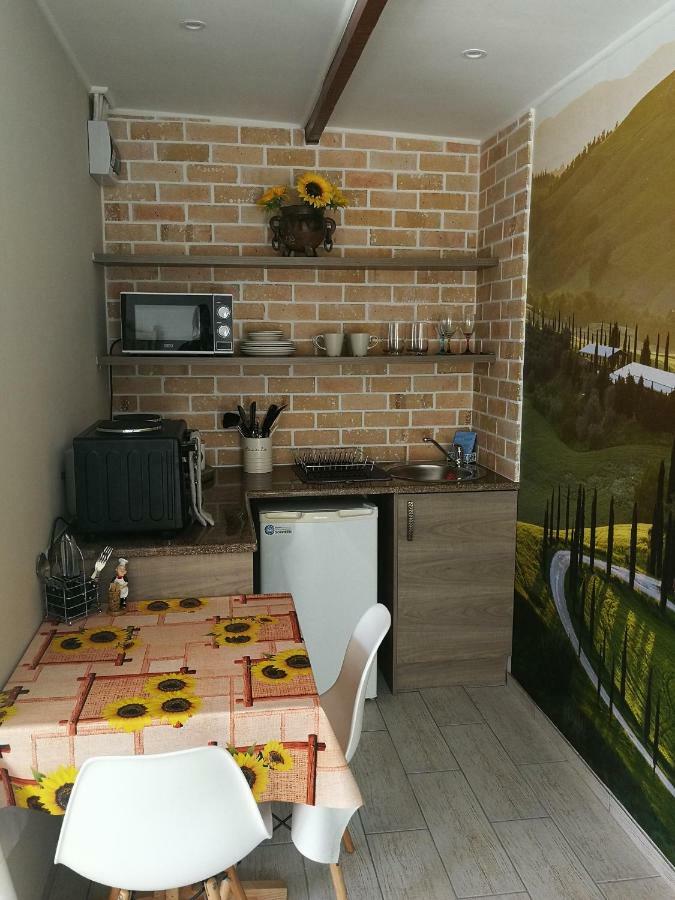 Posto Al Sole - Il Bacio Apartment Bellville Luaran gambar
