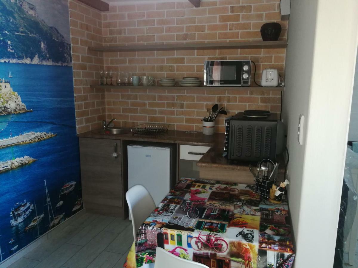Posto Al Sole - Il Bacio Apartment Bellville Luaran gambar