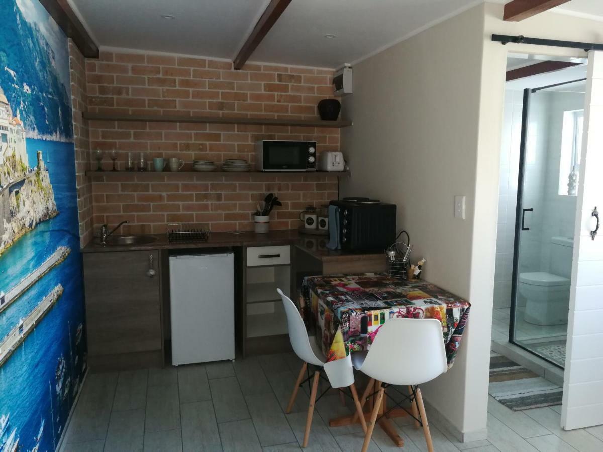 Posto Al Sole - Il Bacio Apartment Bellville Luaran gambar